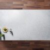 Super White Quartz worktop shown from above with a fine speckle texture across a pale grey-white surface