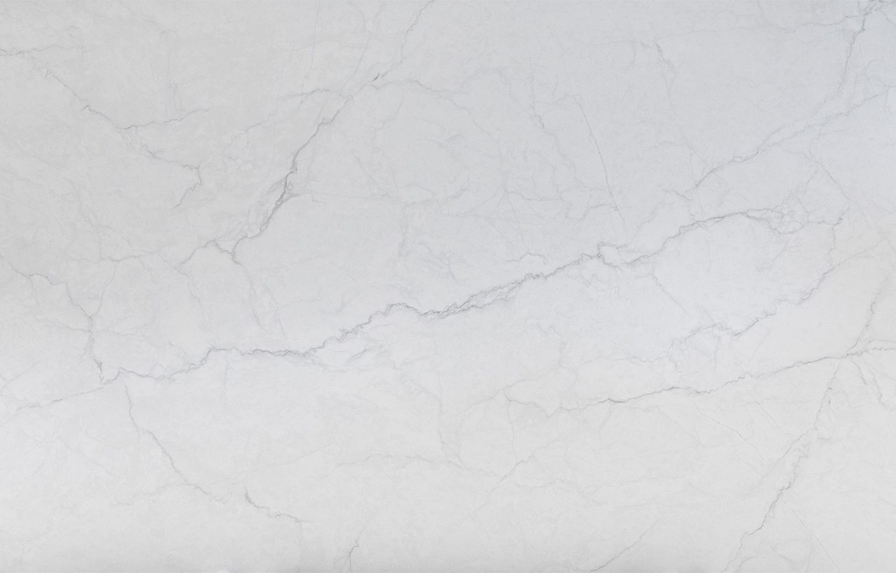 Statuario Venato Porcelain surface detail with very light grey veining and a clean, bright white finish.