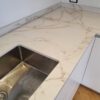 Entzo Porcelain worktop with integrated sink cut out and marble style veining