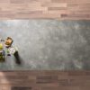 Grey Concrete Quartz full slab shown from above with mid-grey concrete-effect surface and cloudy tonal movement across the worktop