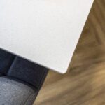 Aspen Shimmer Quartz worktop edge above upholstered seating in a modern kitchen
