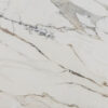 Macchia Antica Porcelain slab detail with sweeping gold and grey veining on a bright white background