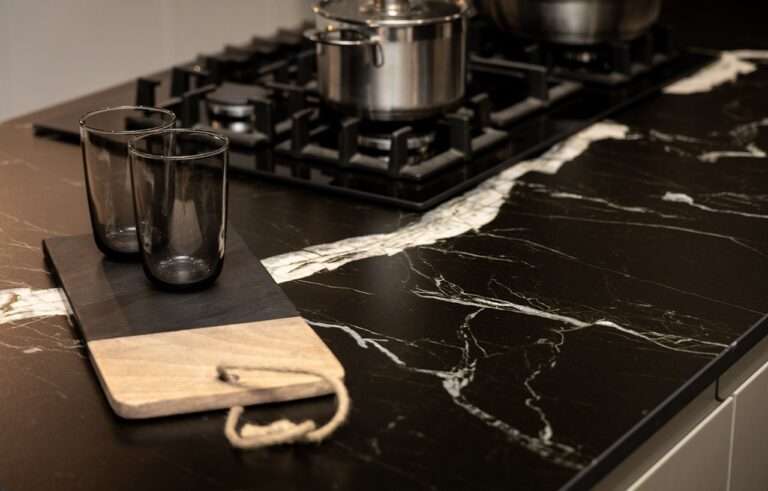 Black Mirage Porcelain worktop detail with gas hob and white veining