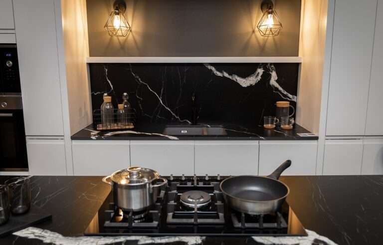 Black Mirage Porcelain splashback and worktop with gas hob